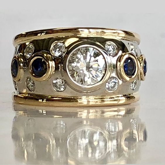 Vintage ring with zirconia inlaid with gold