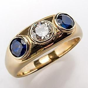 Vintage gold ring with blue glass inlay and zirconium